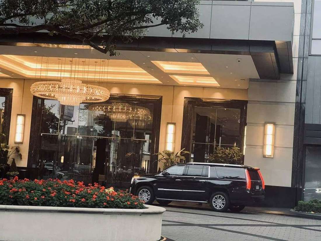 Cadillac Escalade post oak dusk — Houston Limo Chauffeur