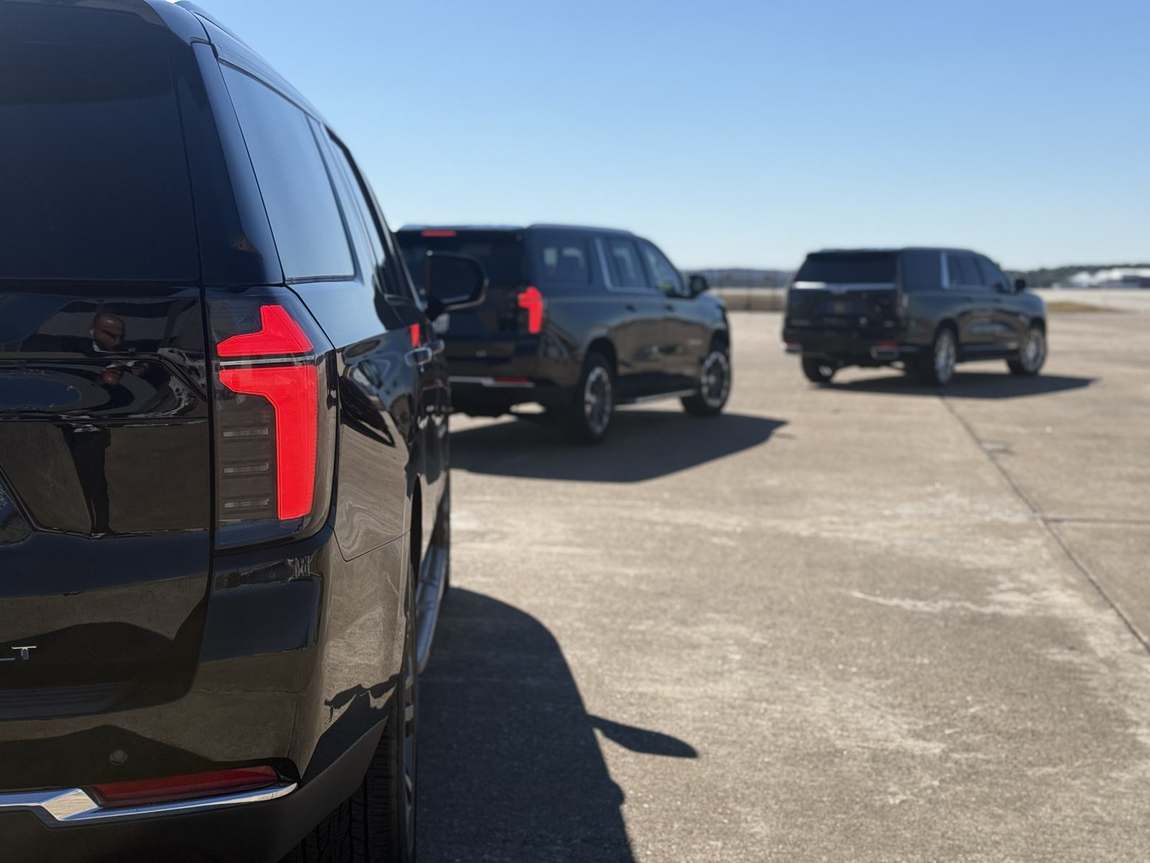 SUVs tarmac taillight — Houston Limo Chauffeur