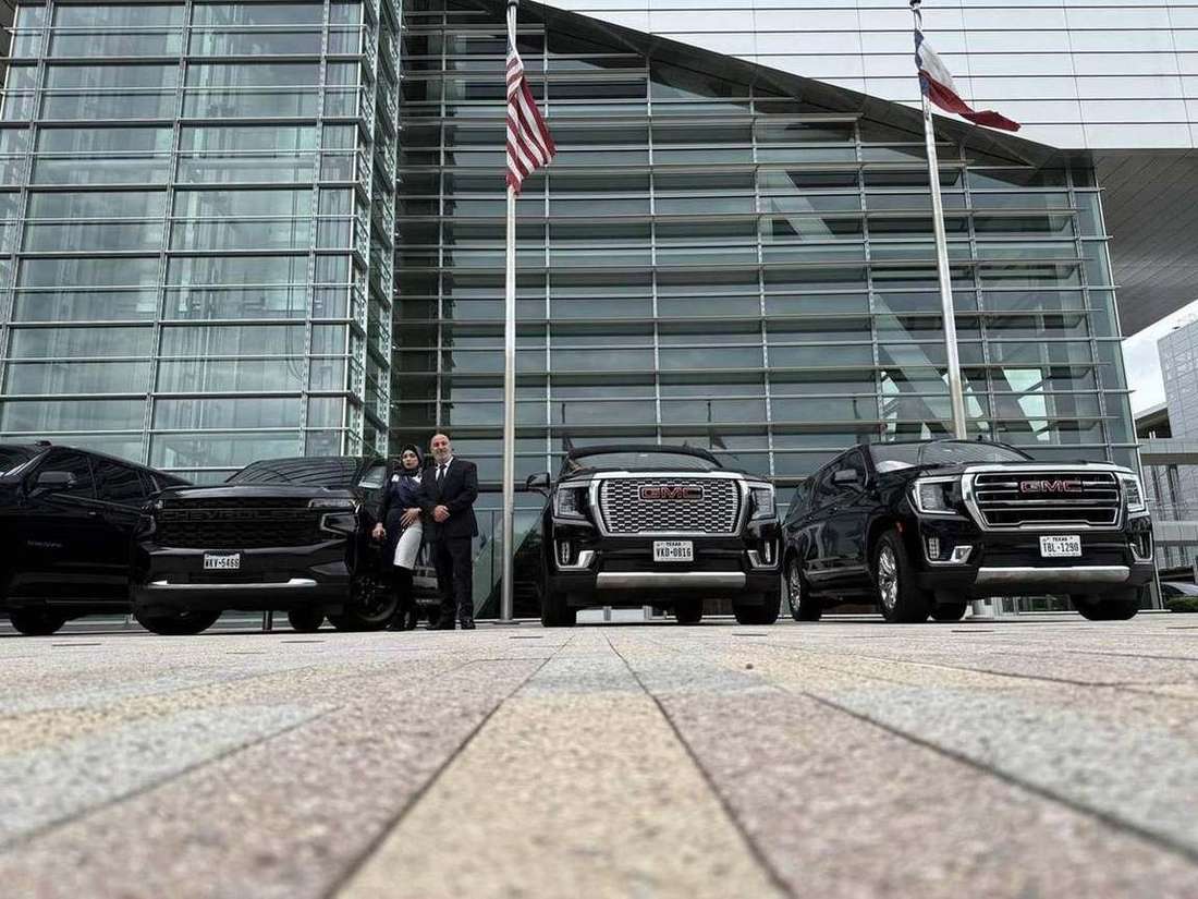 Team flags yukons — Houston Limo Chauffeur