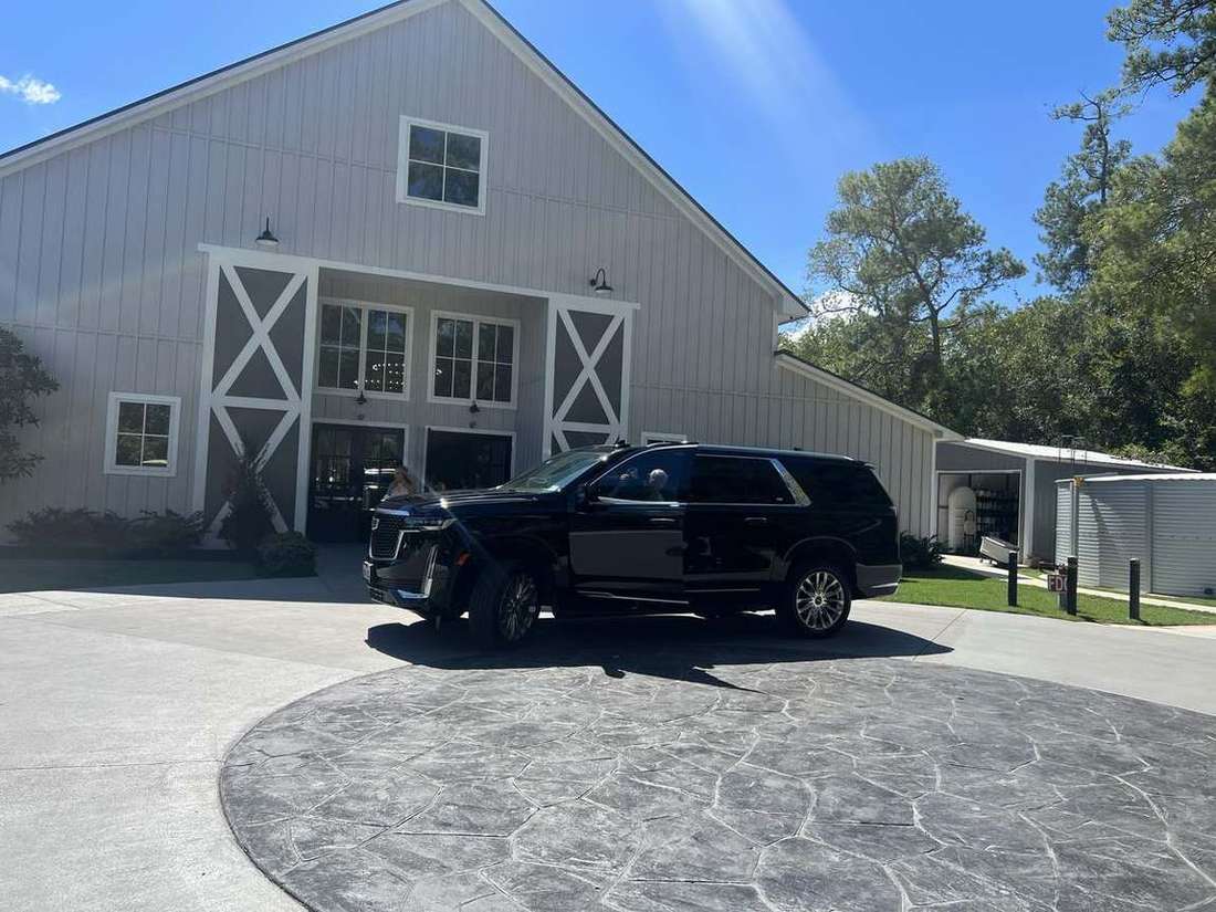 The Woodlands Cadillac Escalade barn front — Houston Limo Chauffeur