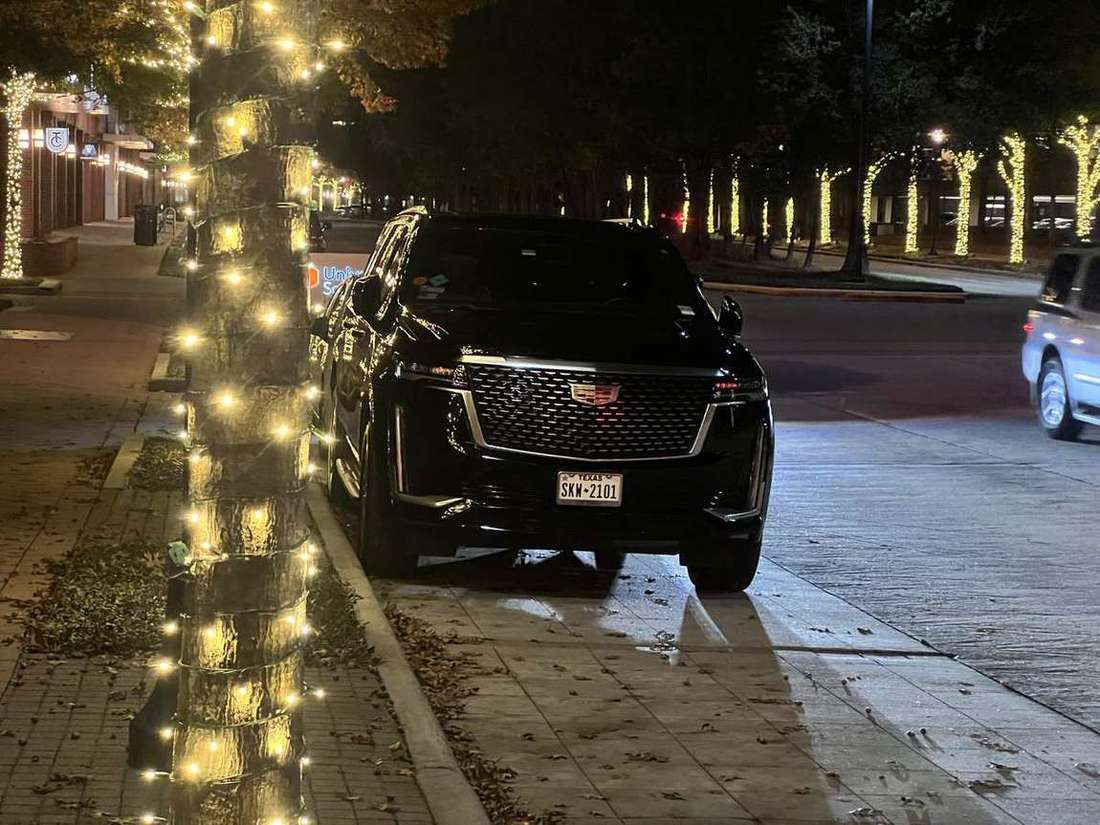 The Woodlands Cadillac Escalade market street lights — Houston Limo Chauffeur